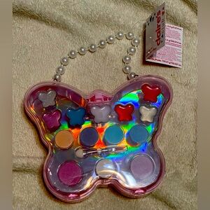 Claire’s butterfly purse 5x5